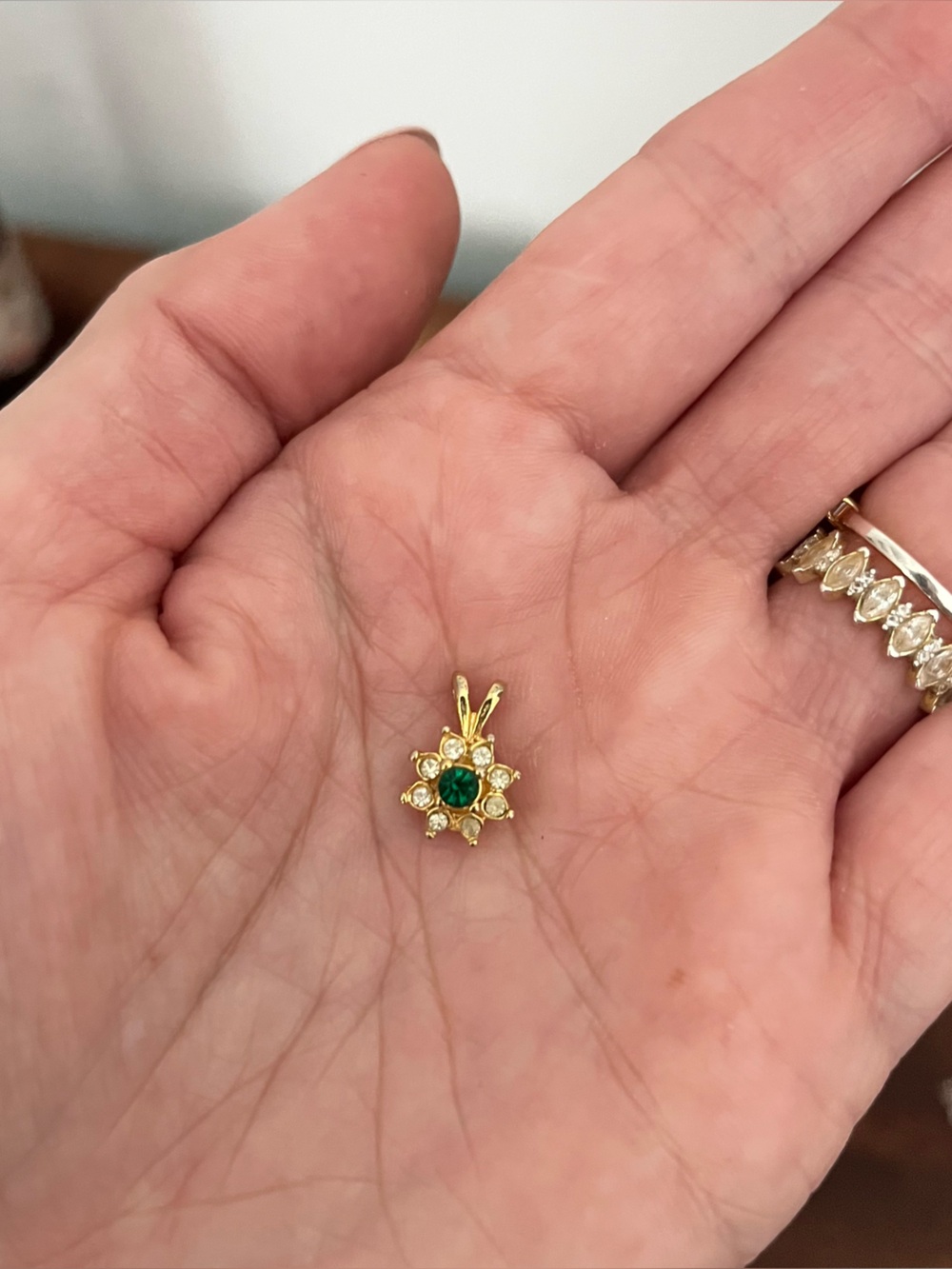 Gold Flower Pendant with Emerald Center
